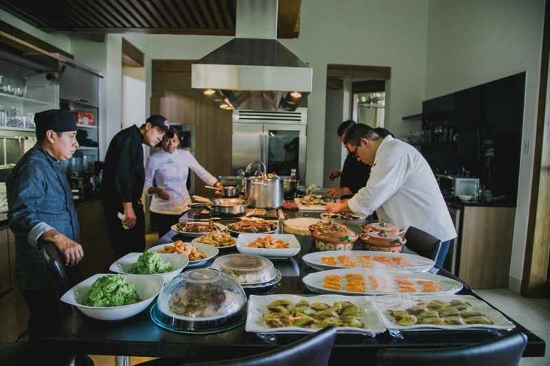 Wings over chef preparing fresh food in kitchen