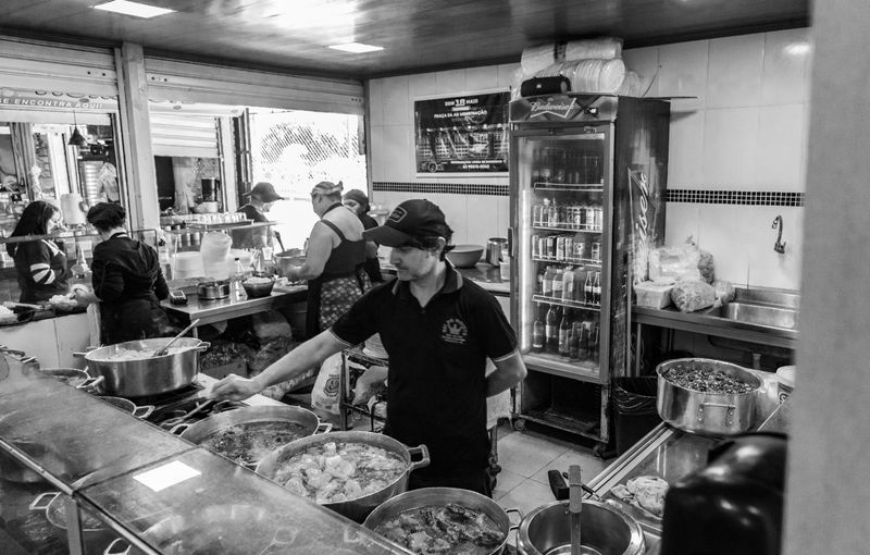 Wings over kitchen crew preparing orders